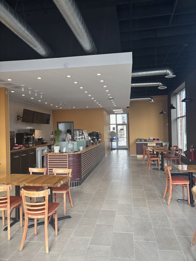 Inside Espresso Cafe Forest Park - cozy seating and warm atmosphere